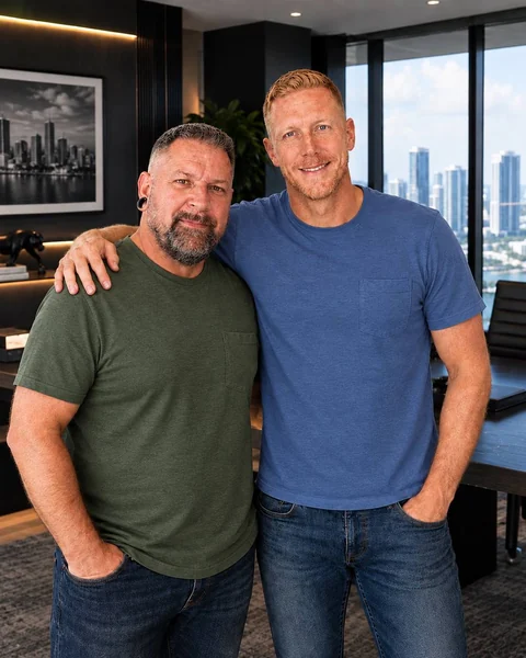 Rabbi Mark Rotenberg and Tim Lane, the founders of EvenPath, standing side by side in an office